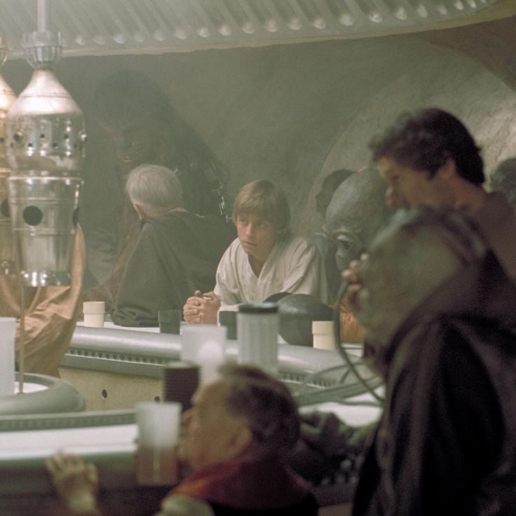 Patrons seated at the cantina bar